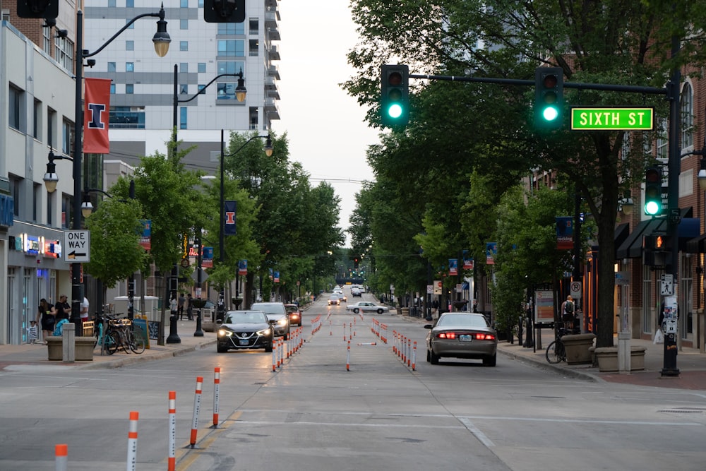 cars on road near buildings during daytime