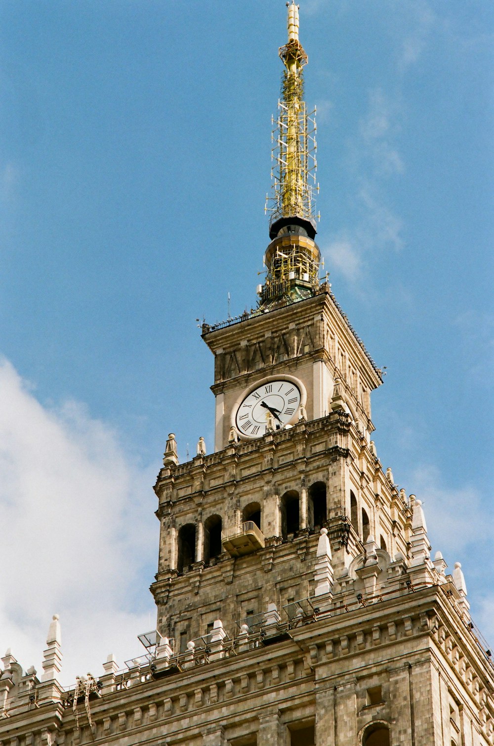 brown concrete tower under blue sky during daytime