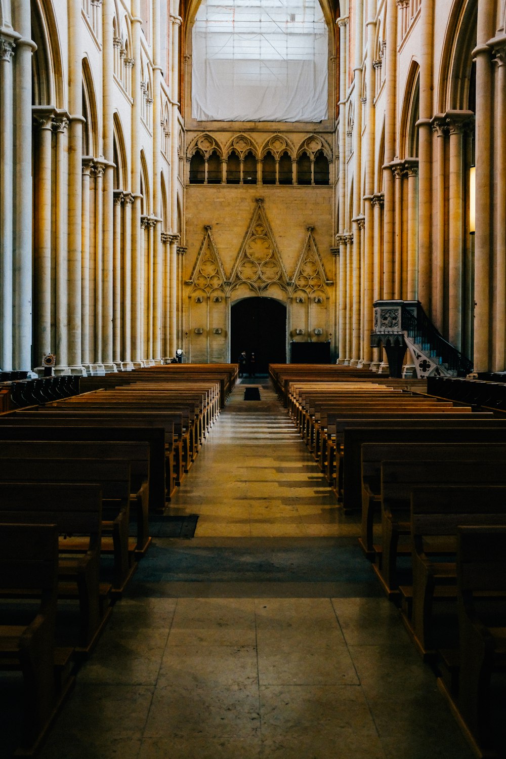 brown wooden bench inside church