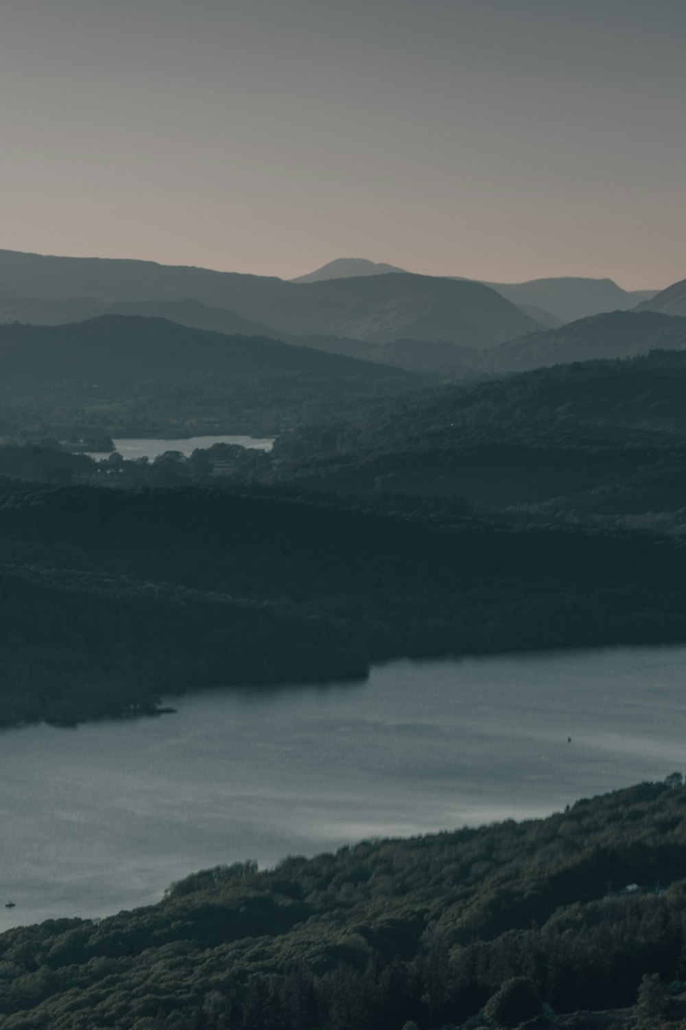 a view of a lake with mountains in the background