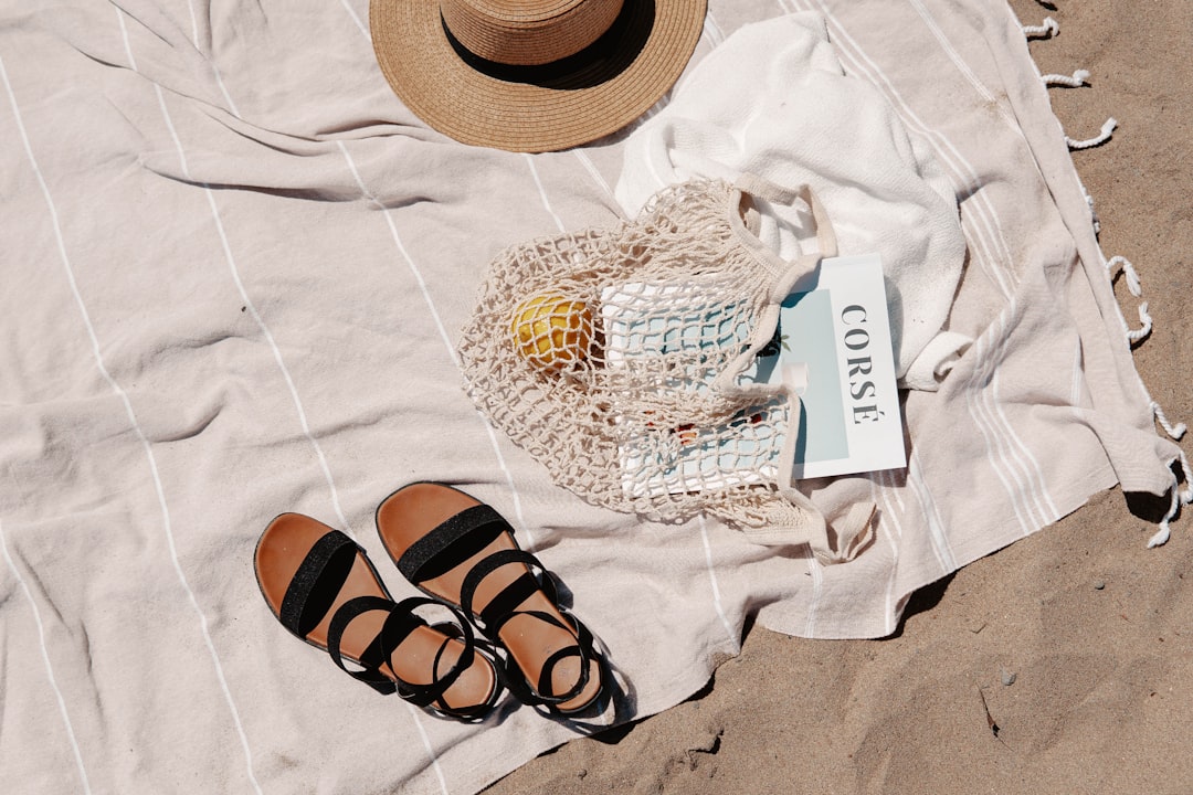 white and brown sun hat