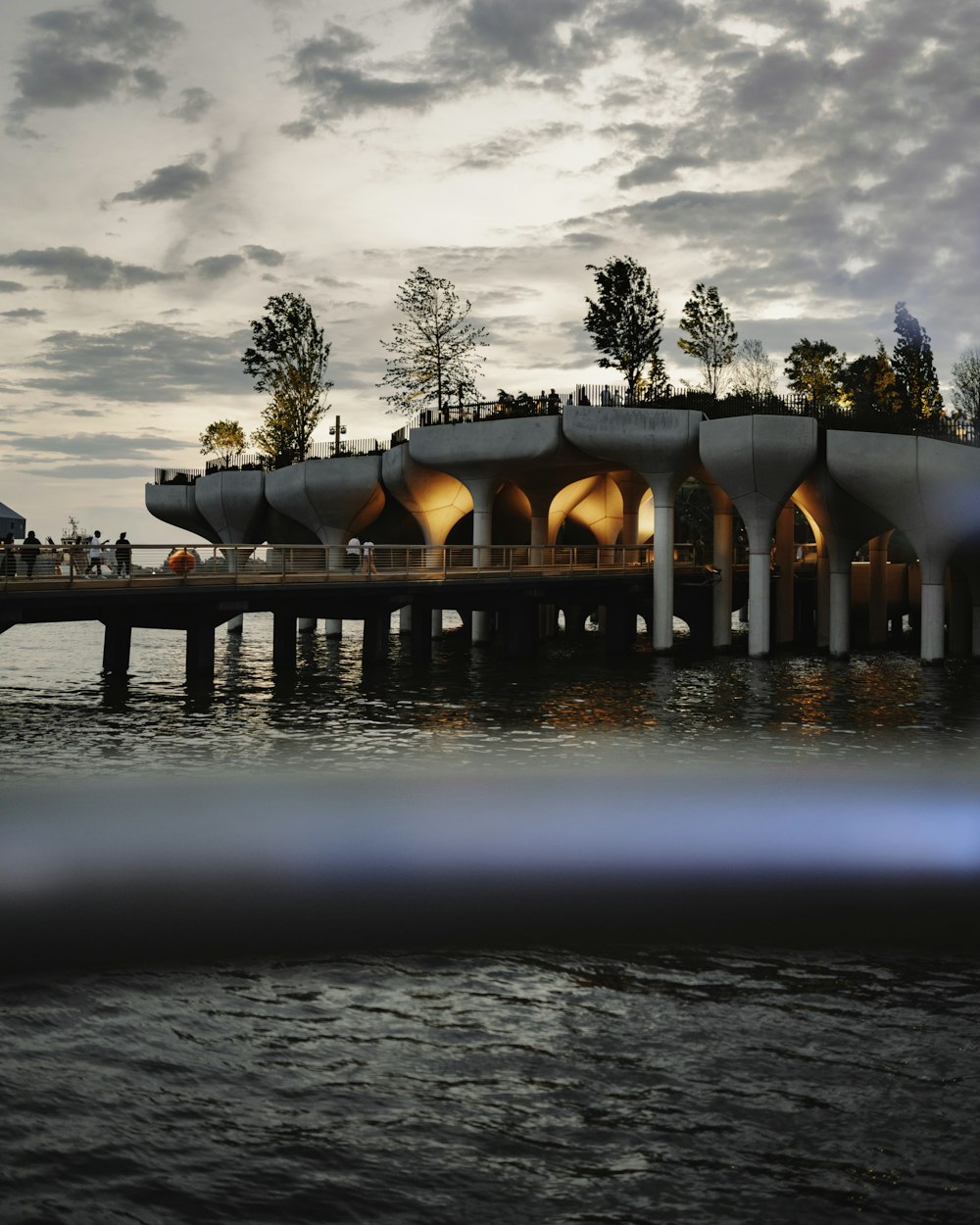 brown concrete bridge over water