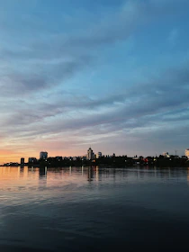 A calm Lagos cityscape at dusk, symbolizing trust and stability.