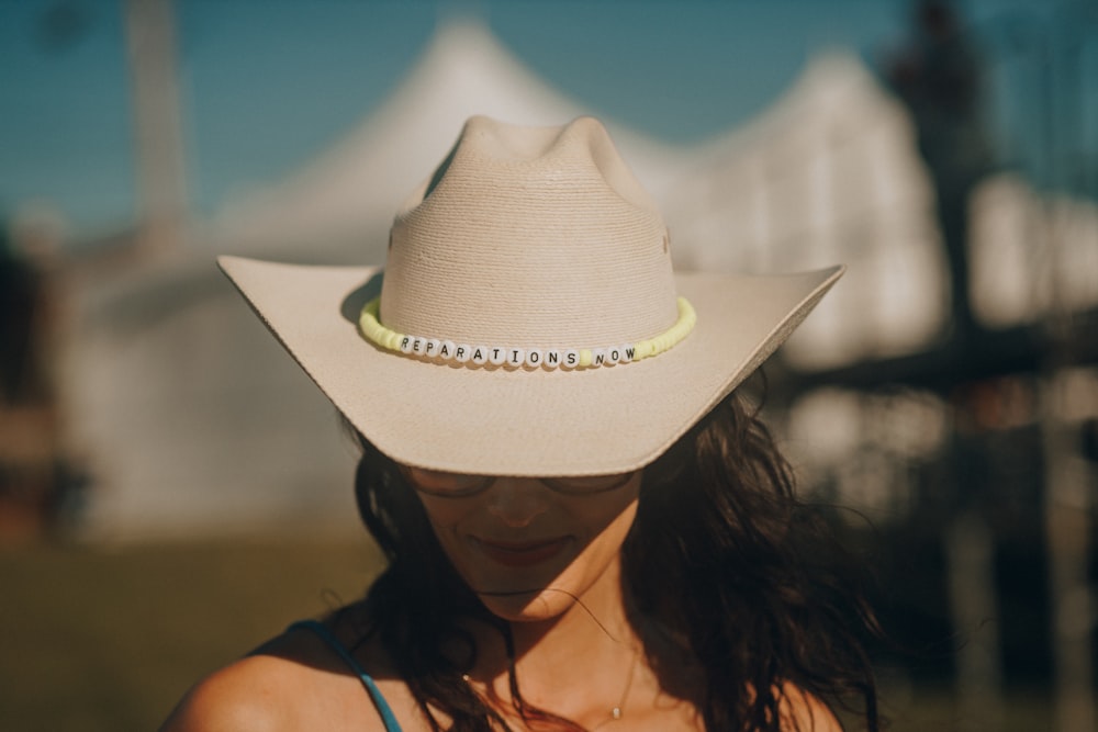 woman in white sun hat