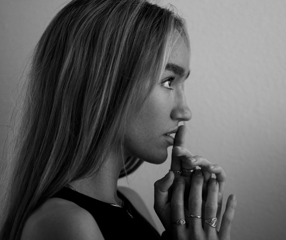 grayscale photo of woman in black tank top