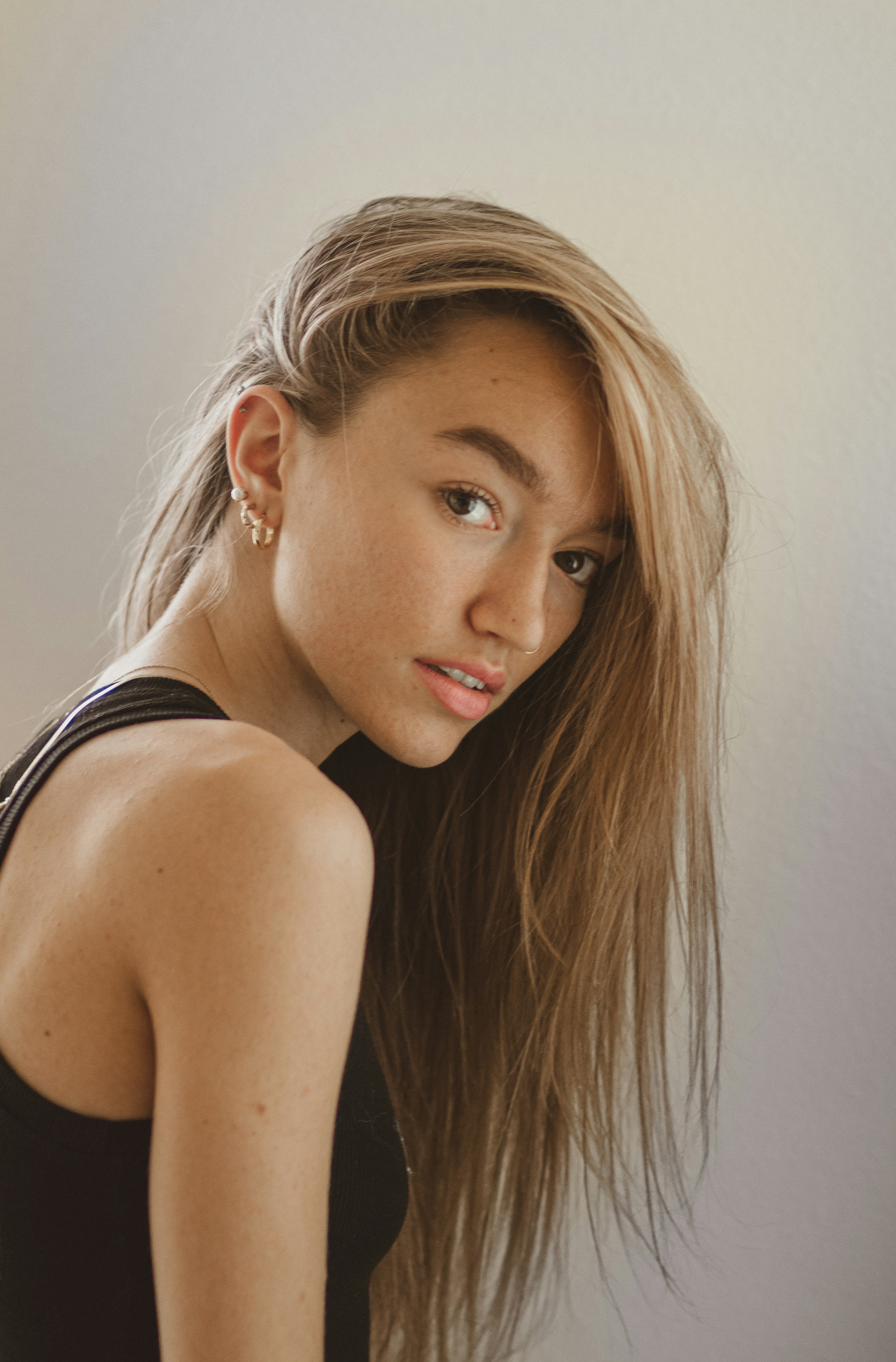 woman in black tank top