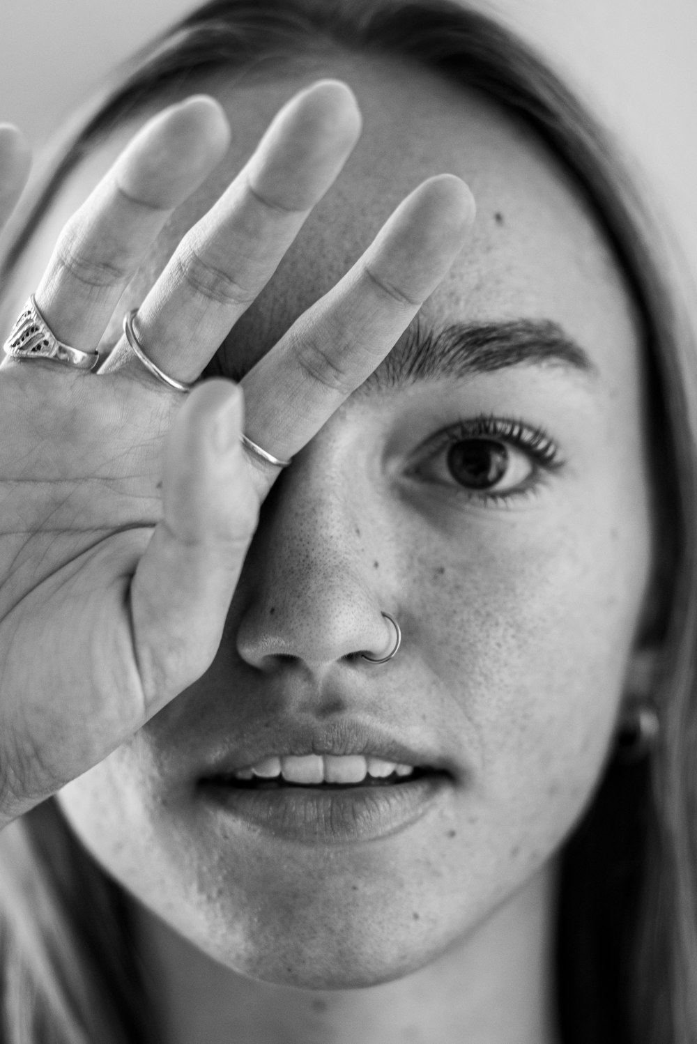 grayscale photo of womans face