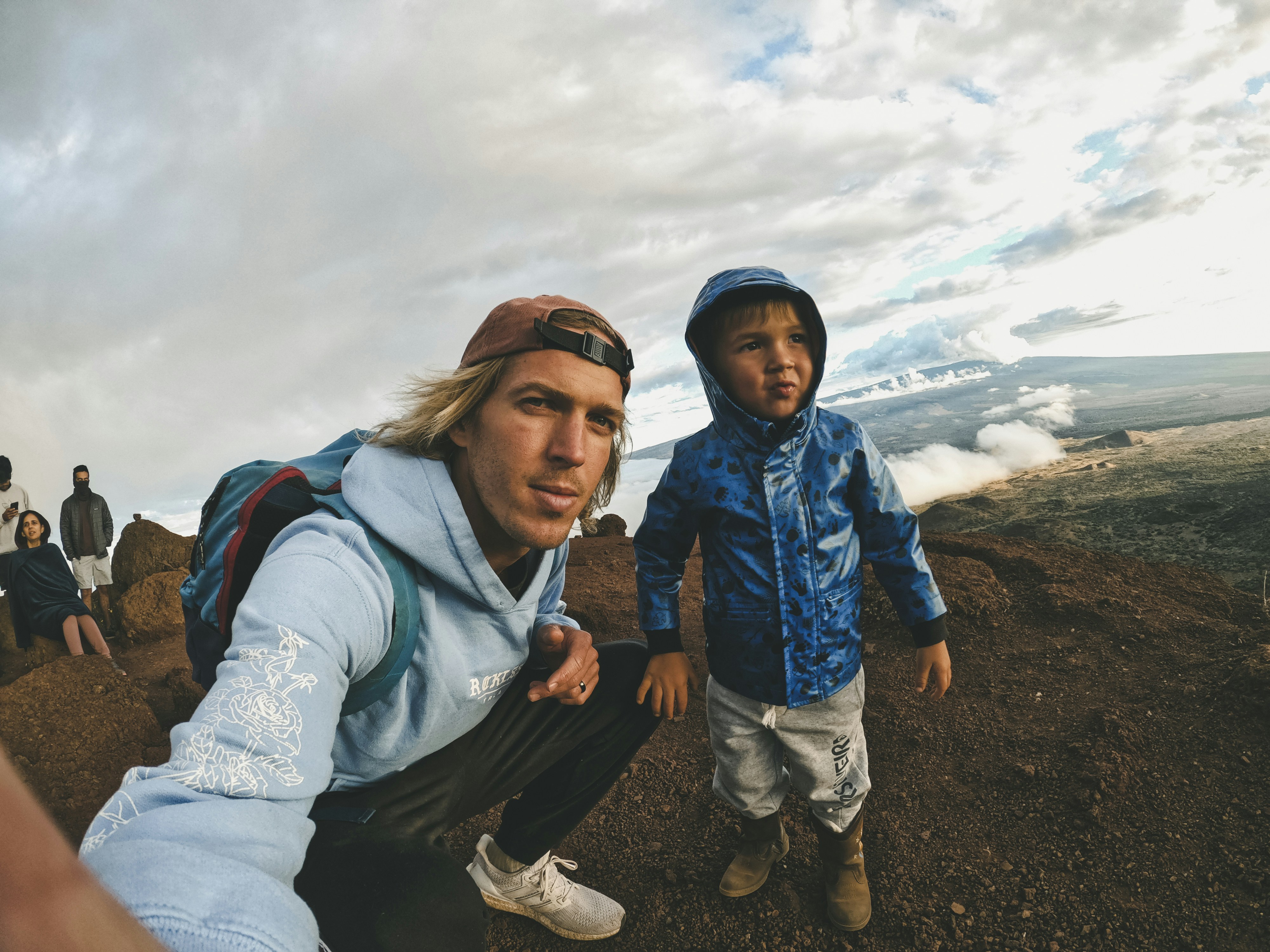 man in gray jacket beside woman in gray jacket