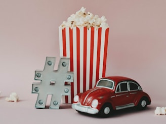 red and white polka dot car toy