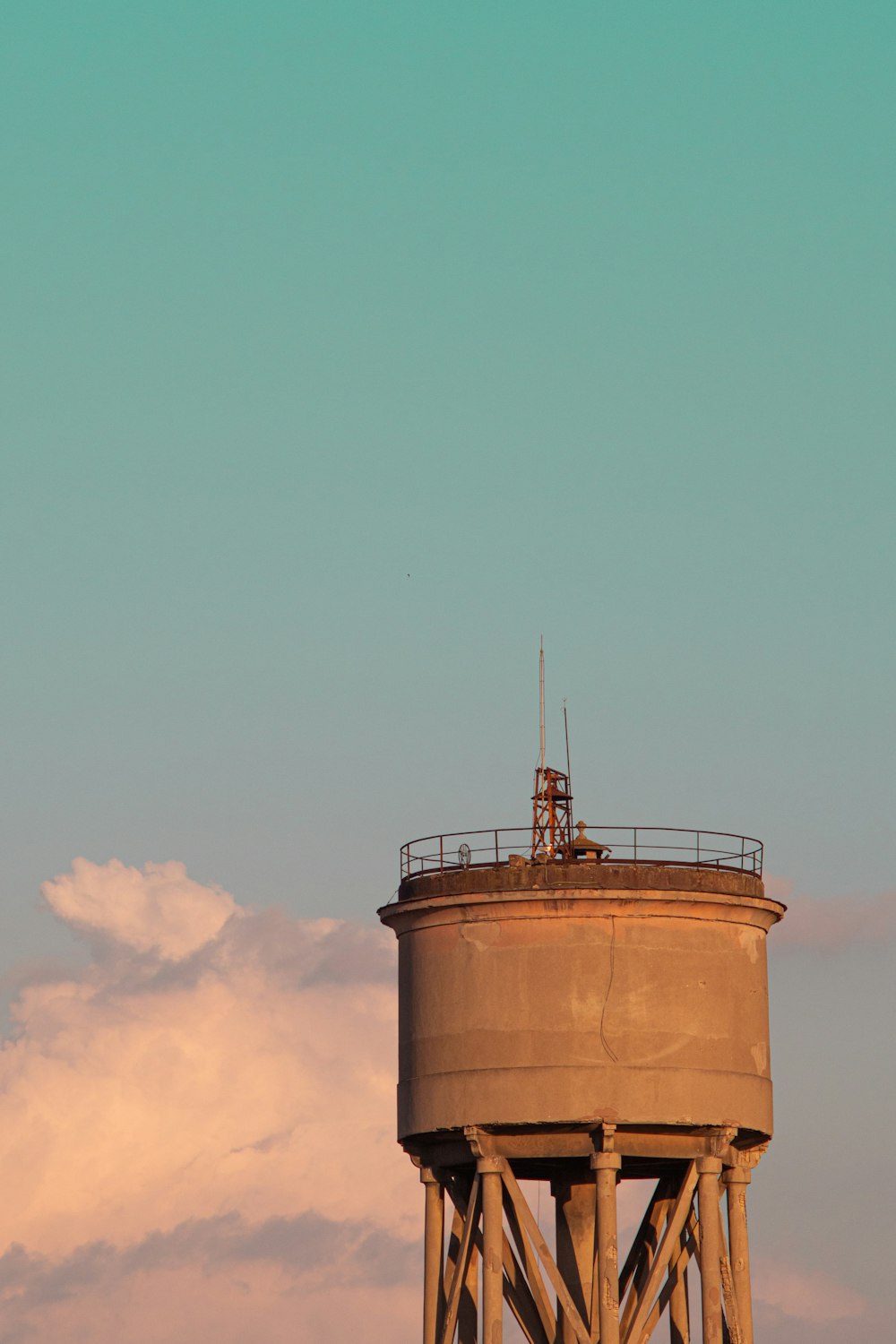 brown and white tower under blue sky