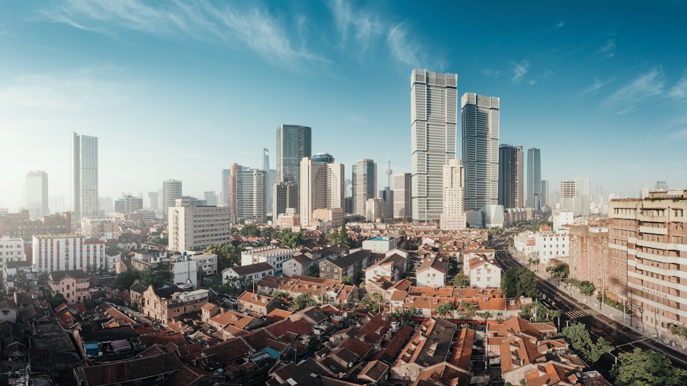 city buildings under blue sky during daytime