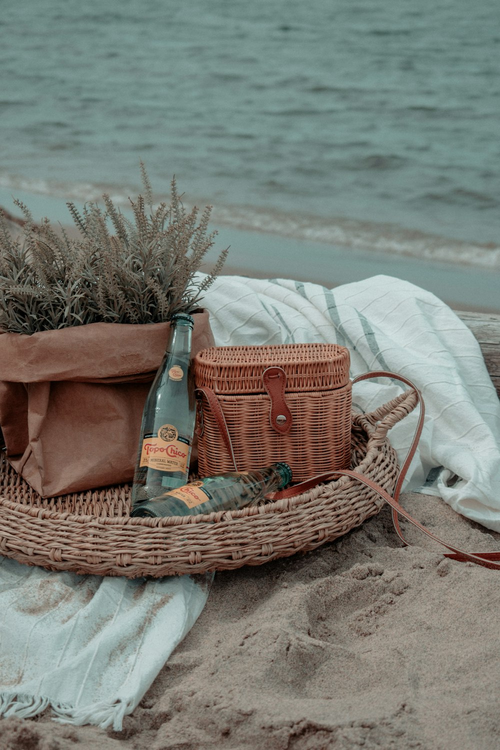 brown woven basket with brown and green plastic pack