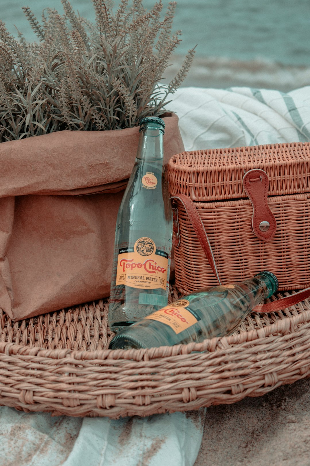 brown leather bag on brown woven basket