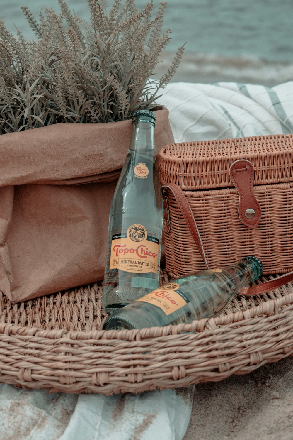 brown leather bag on brown woven basket