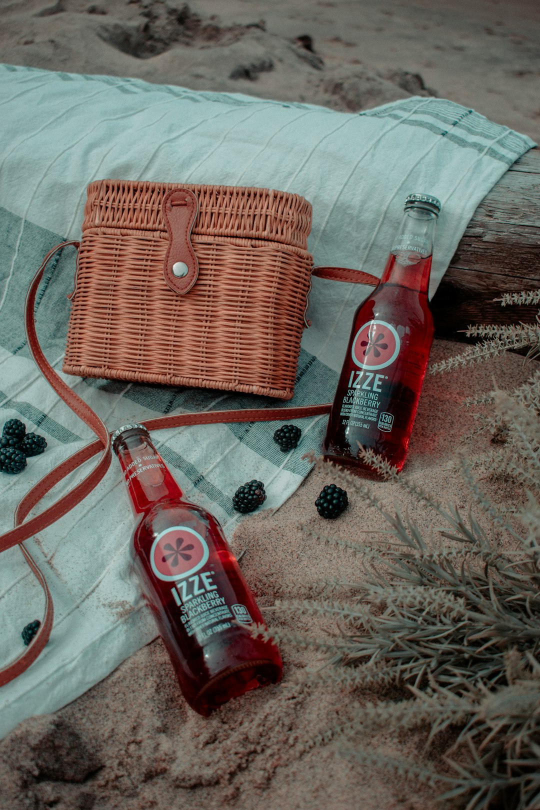 red plastic bottle beside brown woven basket