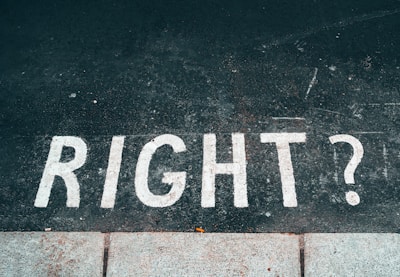 black and white stop road sign