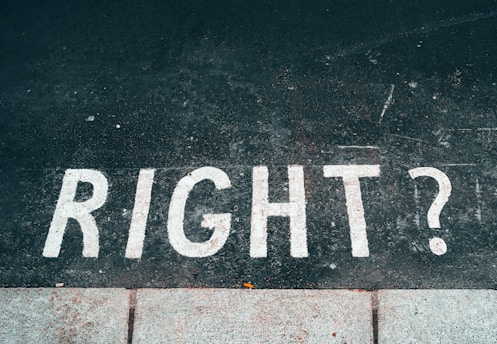 black and white stop road sign