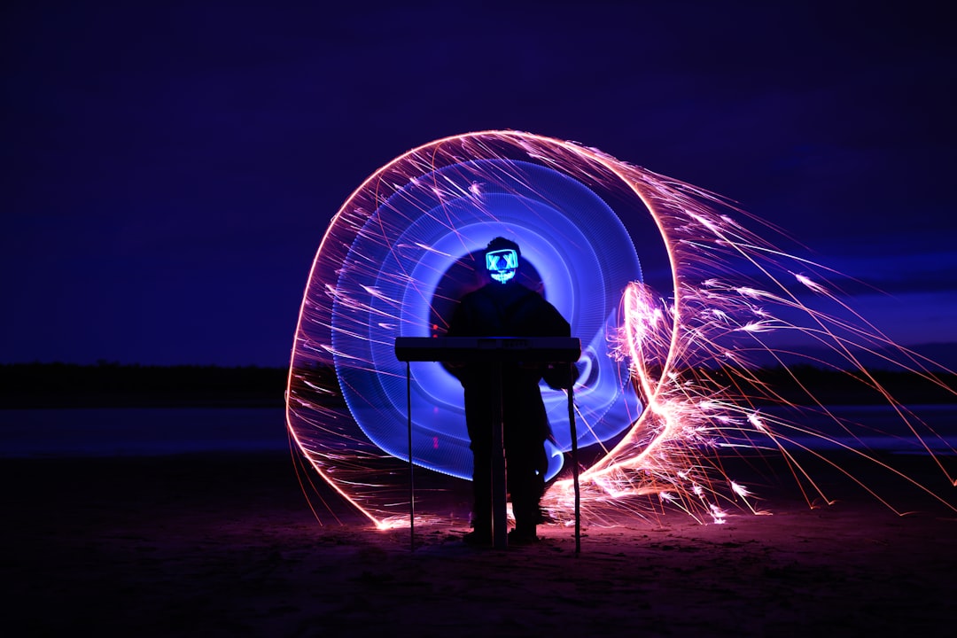 man standing on a steel wool photography
