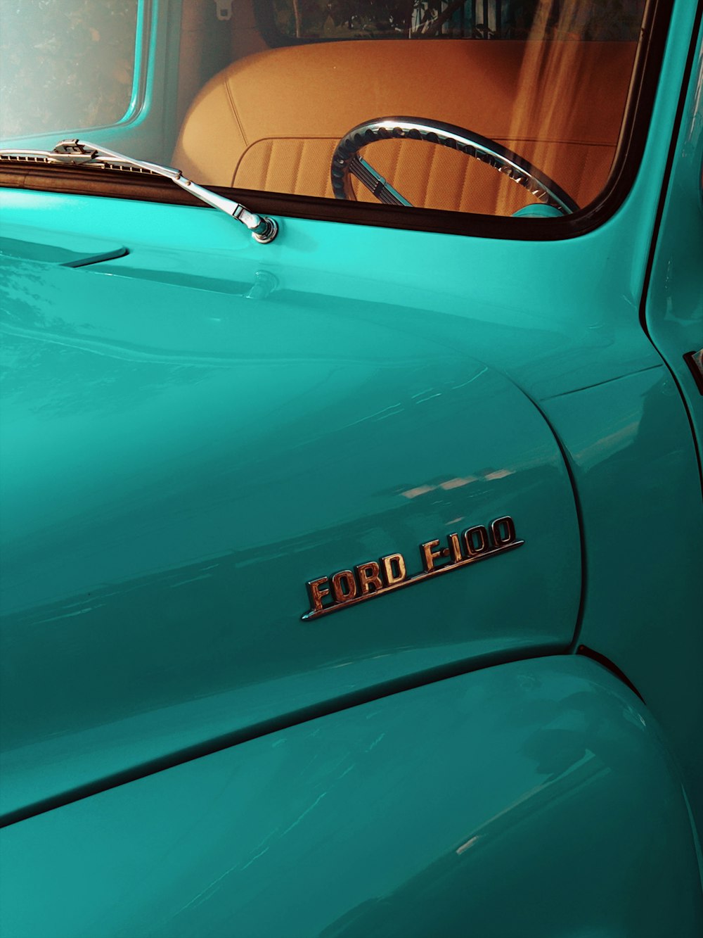 green chevrolet camaro in close up photography