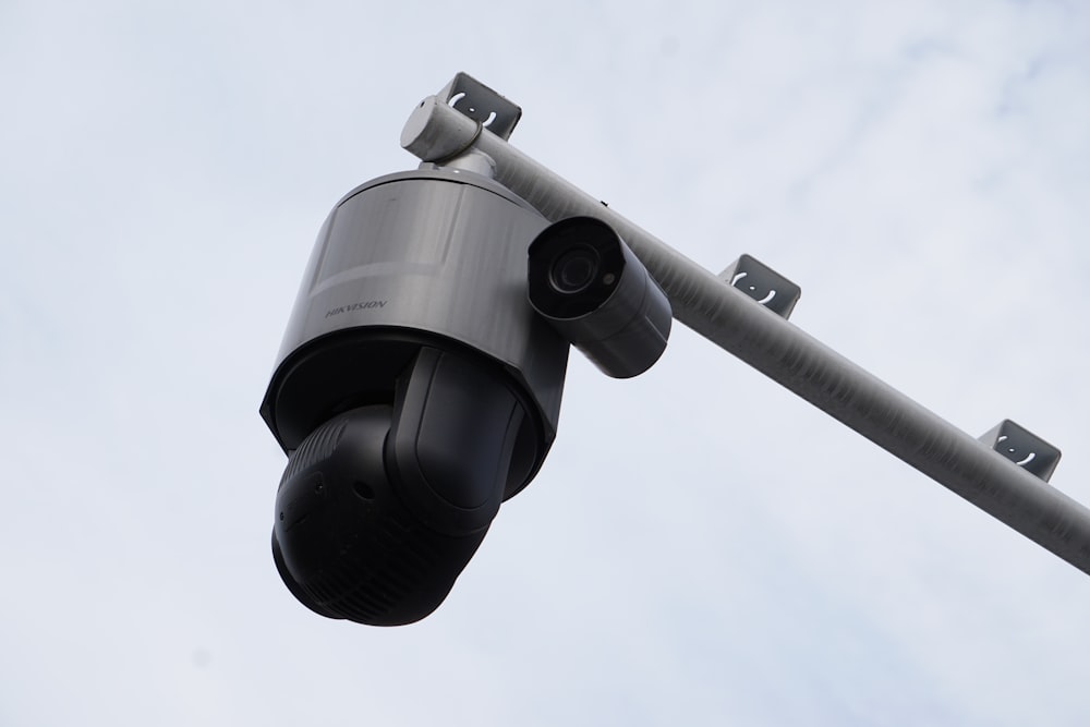 black and silver telescope under blue sky during daytime