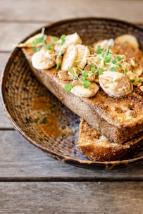 A close-up of a slice of sweet bread with toppings.