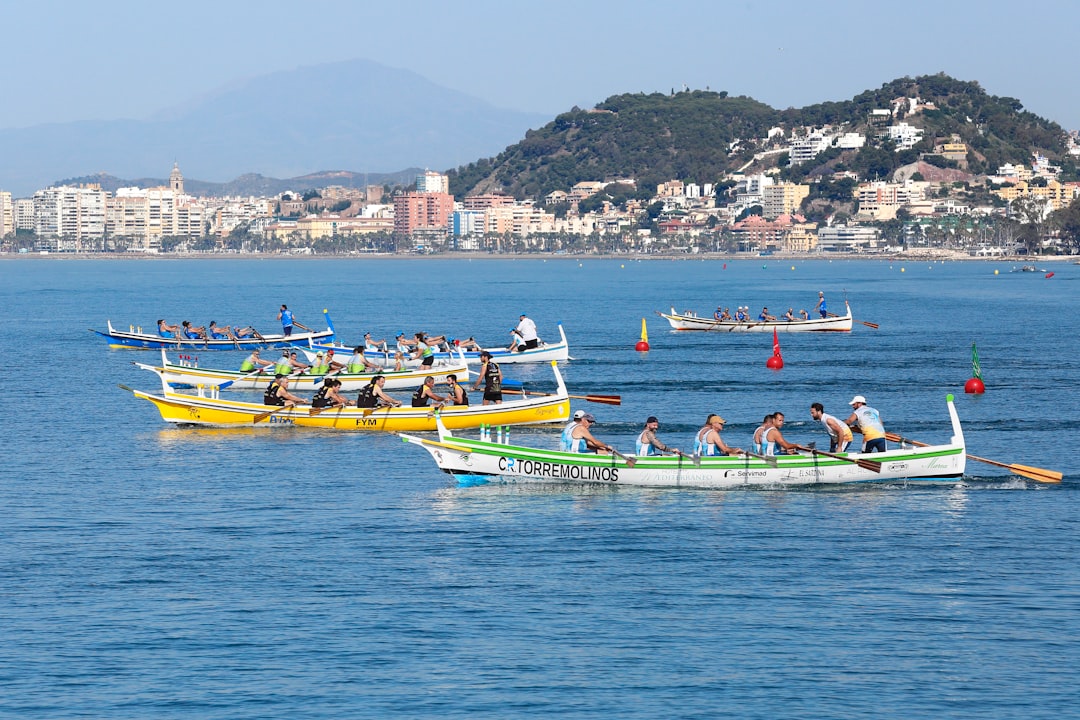 people riding on yellow kayak on sea during daytime