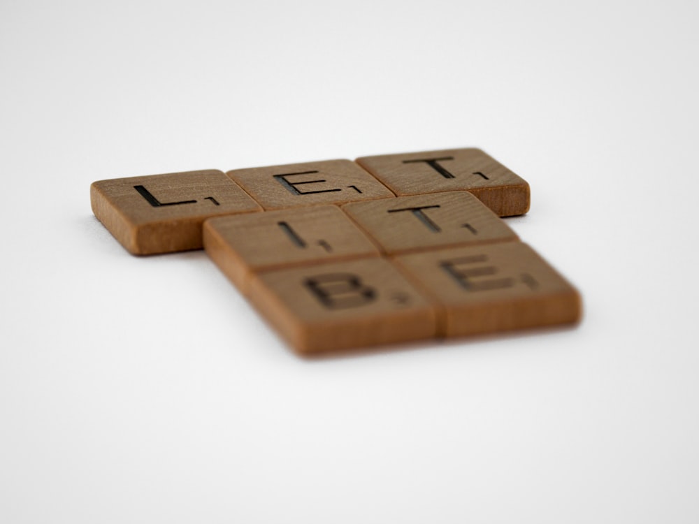 brown wooden blocks on white surface