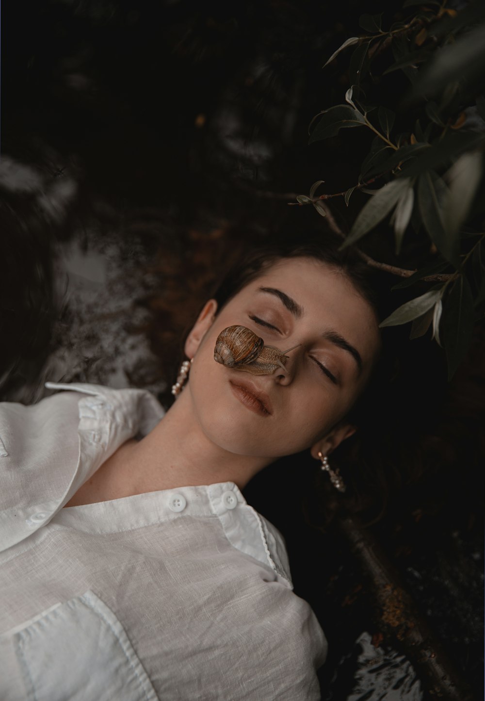 woman in white dress wearing gold ring