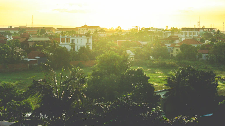 A serene residential plot in Sarangapur bathed in golden evening light