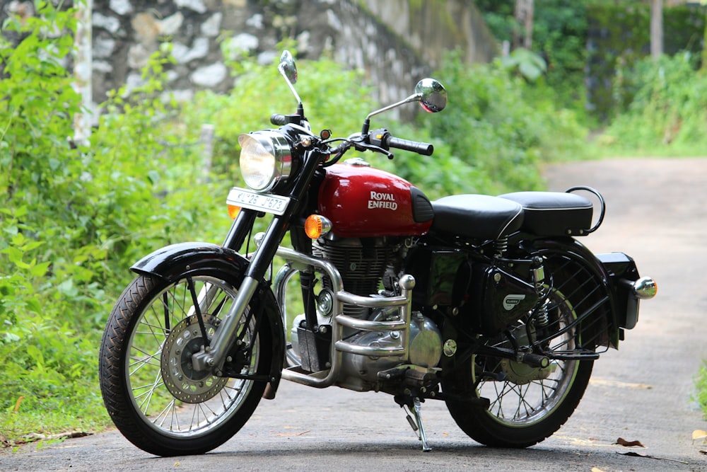 red and black motorcycle on road during daytime