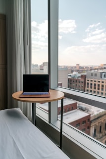 macbook pro on white table