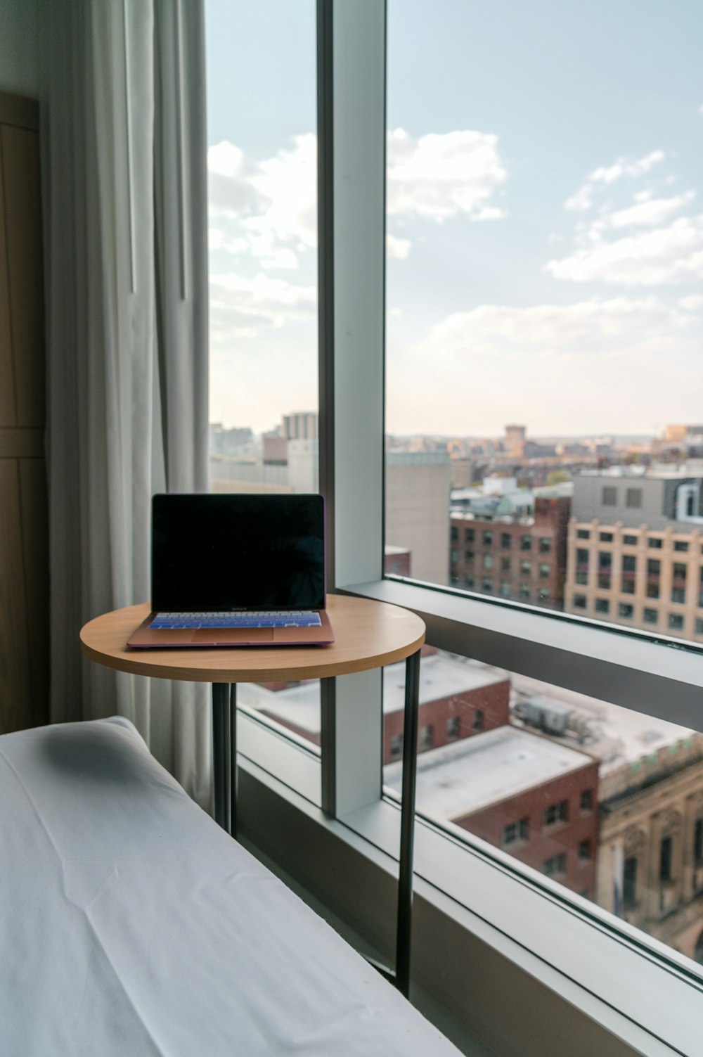 macbook pro on white table