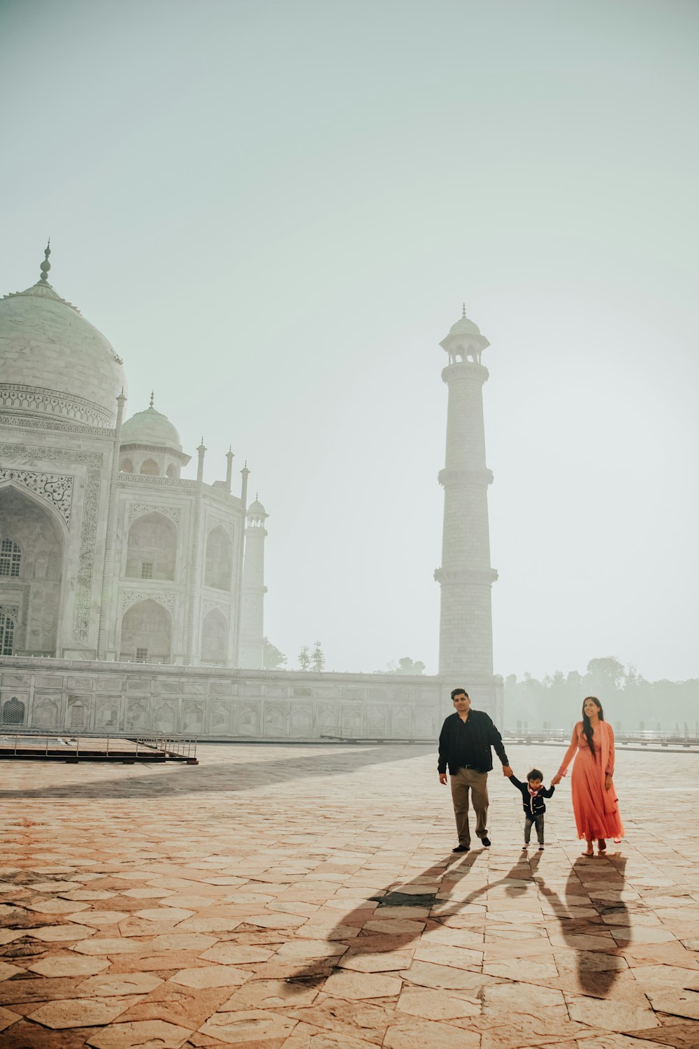 man and woman walking on the street