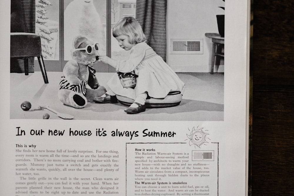 grayscale photo of girl sitting on floor