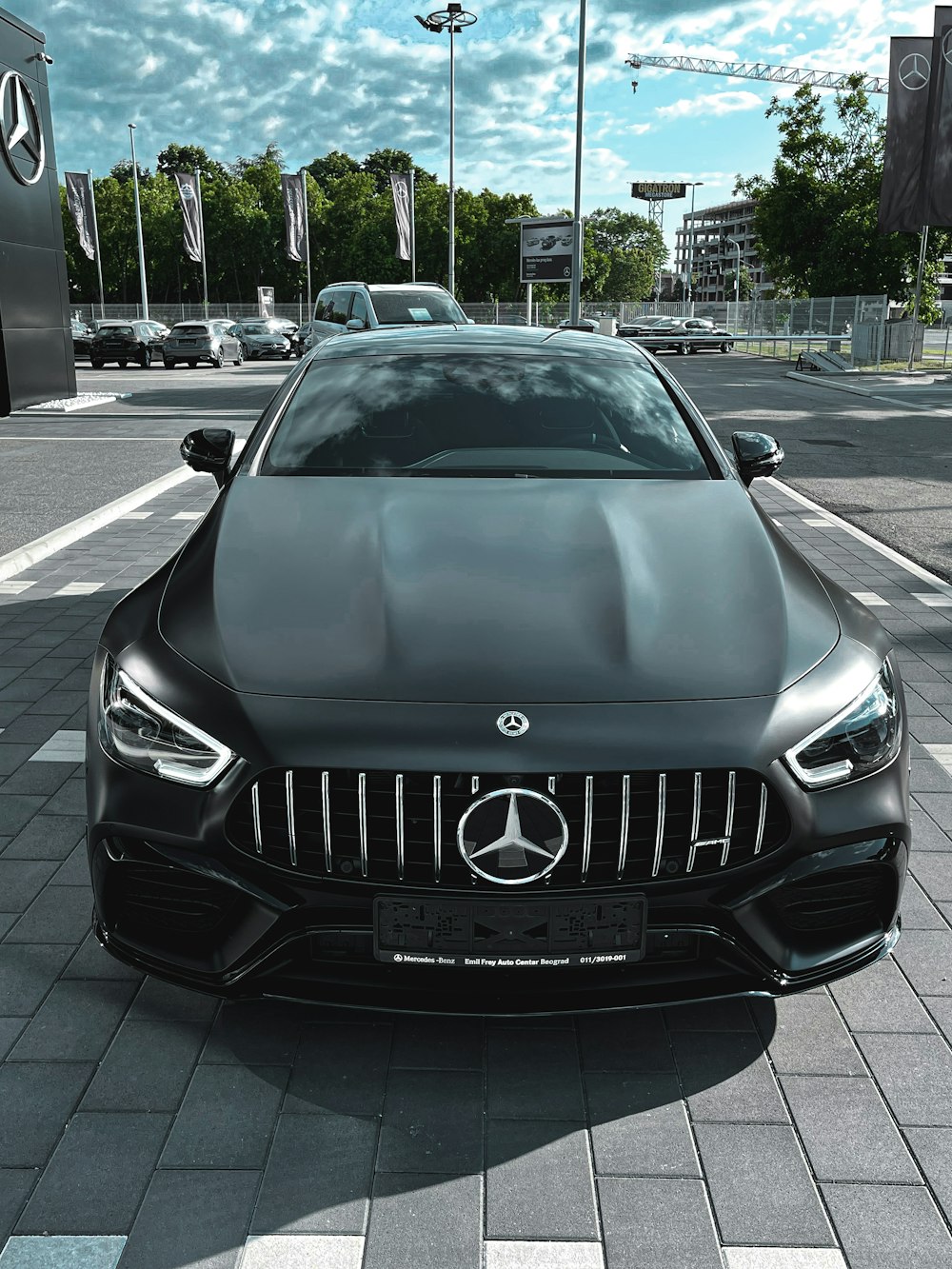 black mercedes benz car on road during daytime