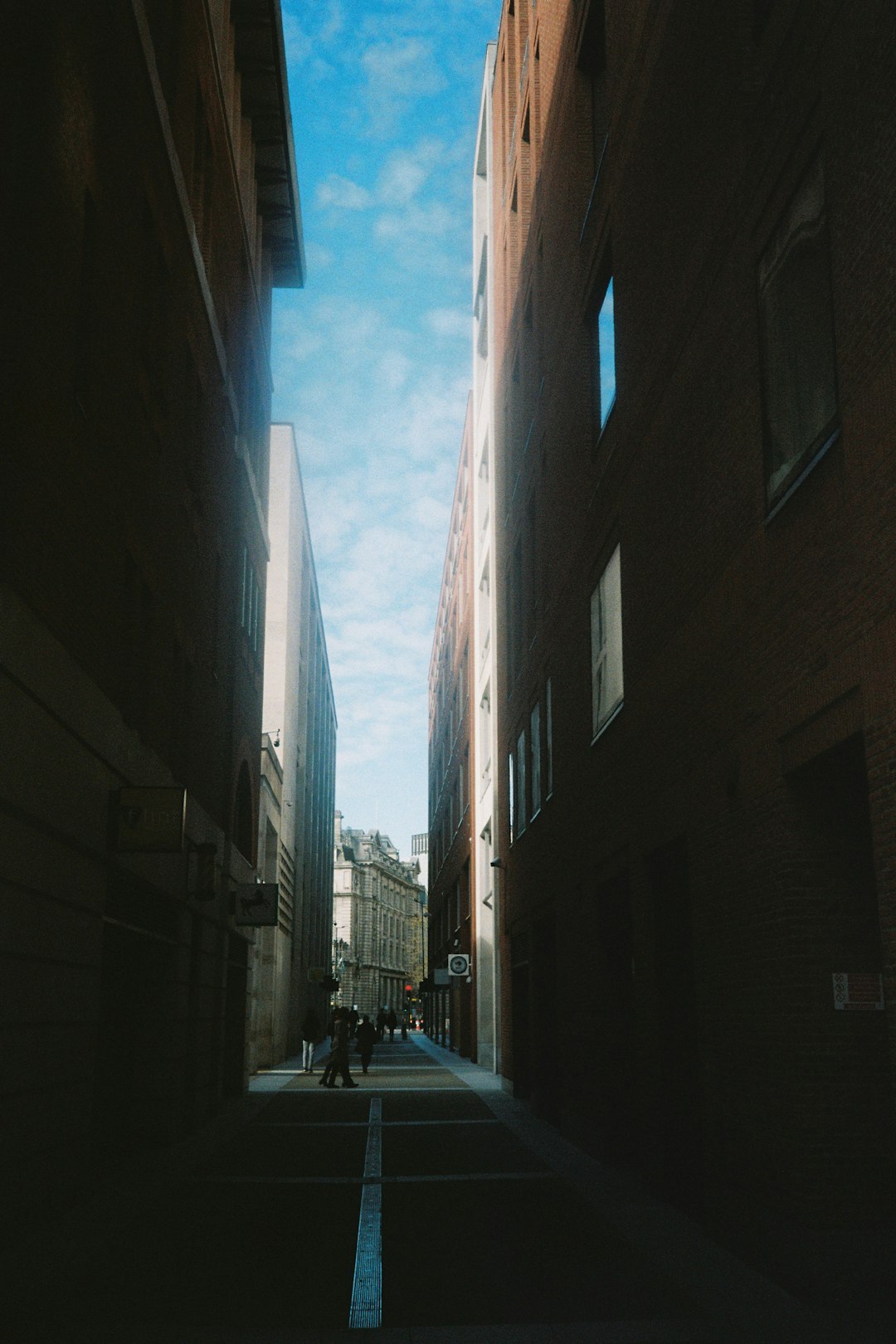 cars parked in front of building during daytime