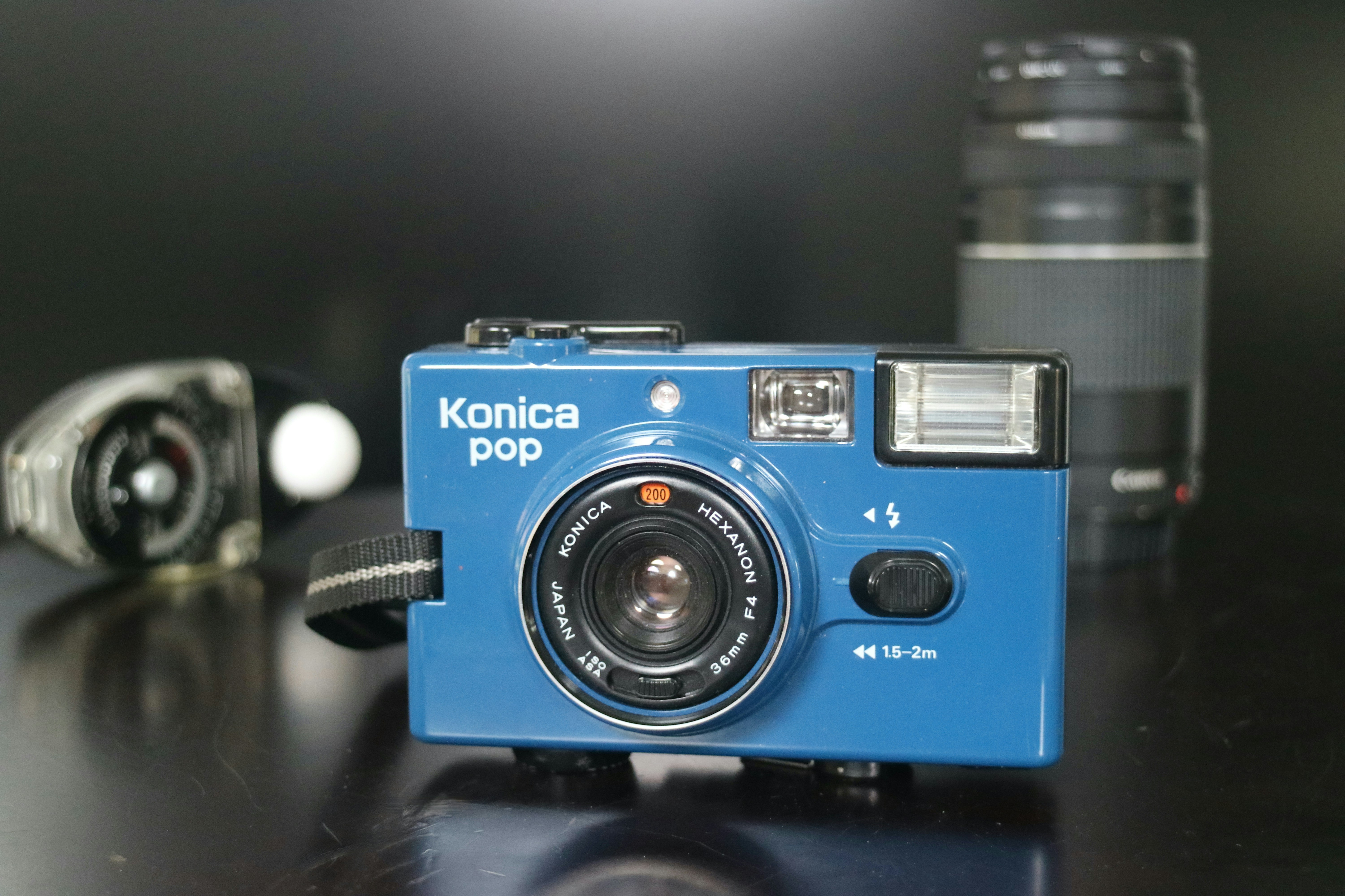 A still life photo of a Konica pop camera from the 1980s.
