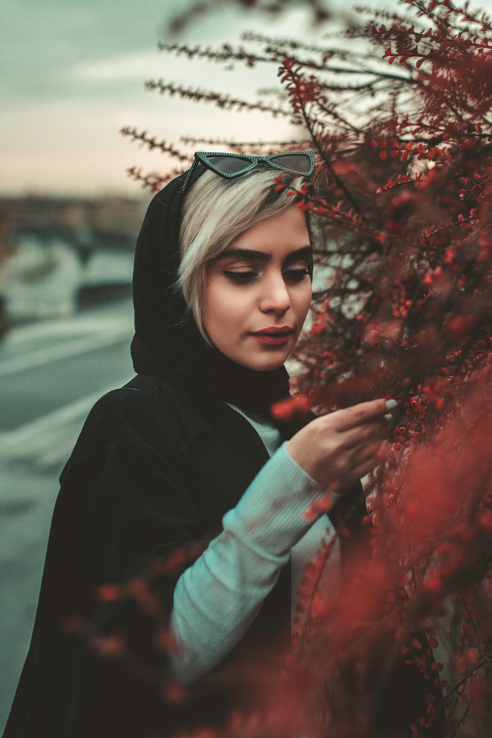 woman in black hijab and gray long sleeve shirt