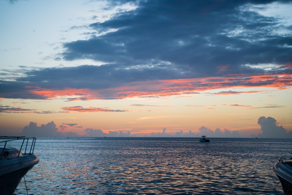 silhouette of people on beach during sunset