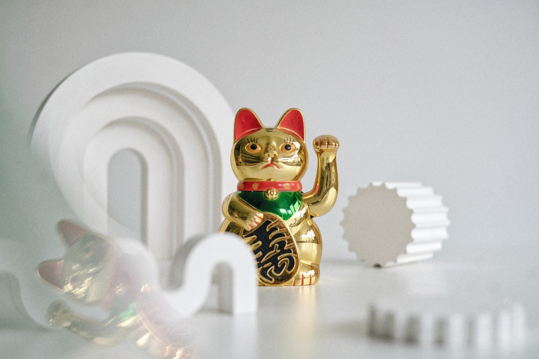 gold and red buddha figurine