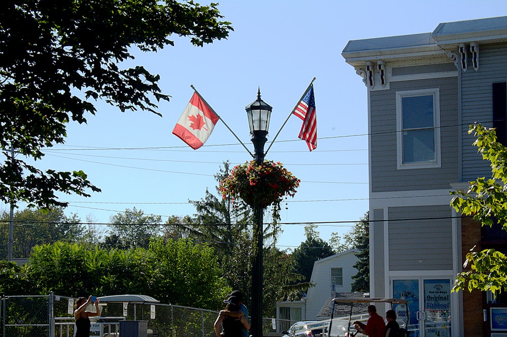 white and red flag on pole