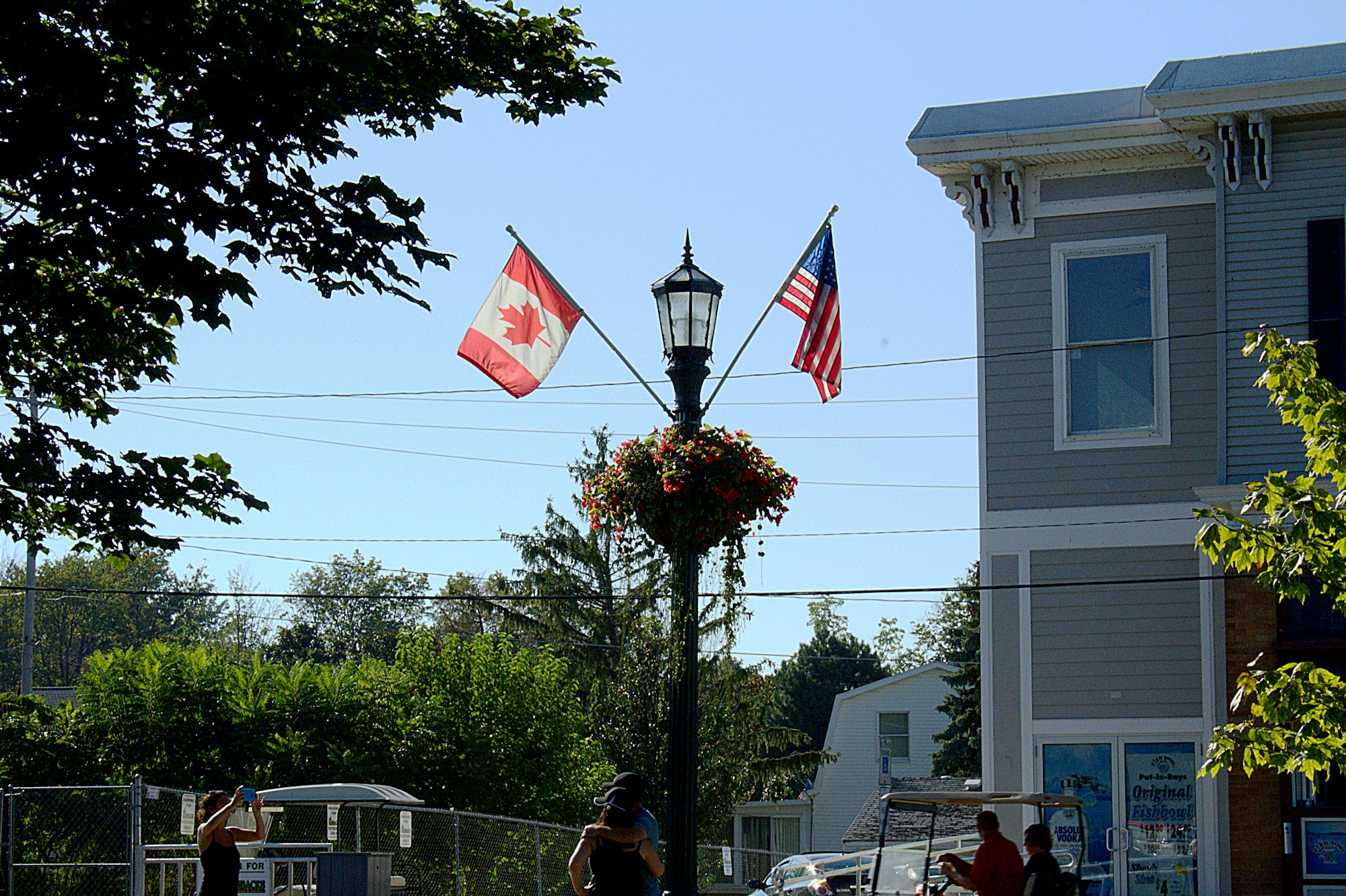 white and red flag on pole