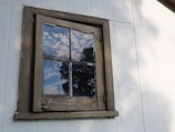 A well-maintained wooden window frame freshly painted and sealed.