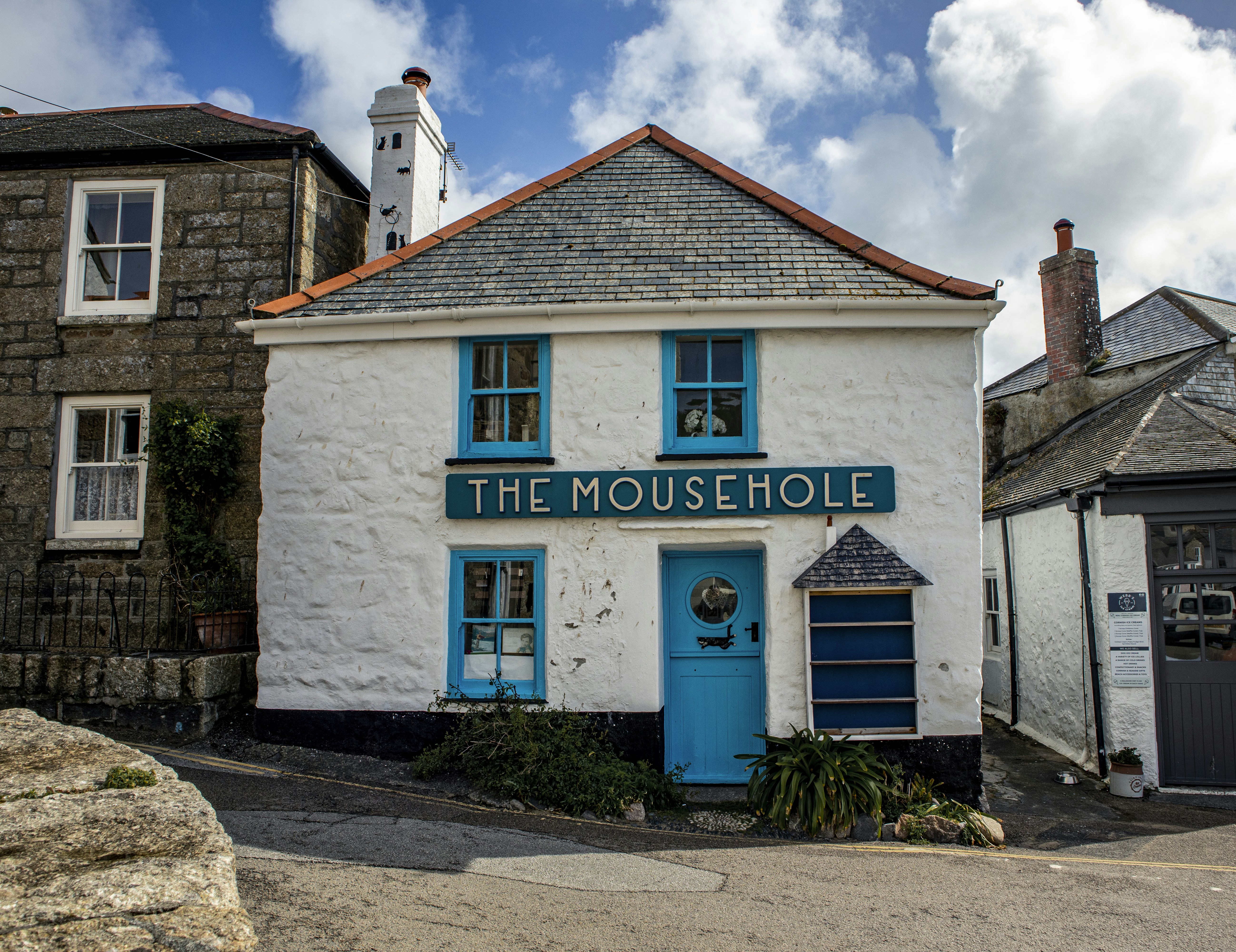 white and blue wooden building under blue sky during daytime, The Mousehole, Cornwall
