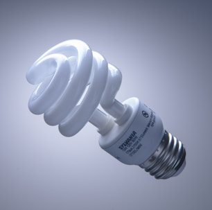 white light bulb on white surface