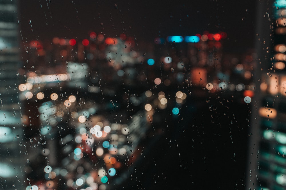 water droplets on glass window during night time photo – Free Japan Image  on Unsplash