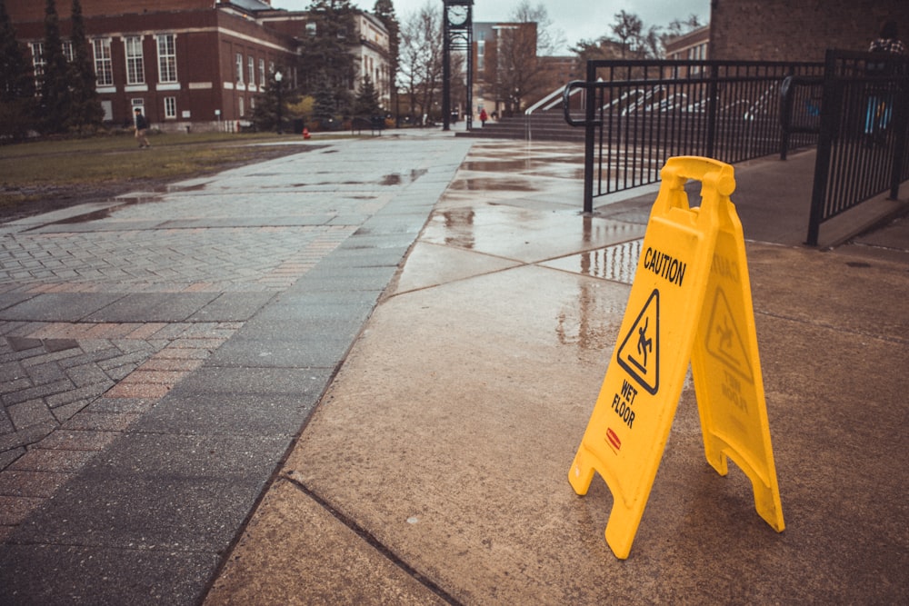 yellow caution wet floor sign
