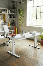 white wooden table with chairs