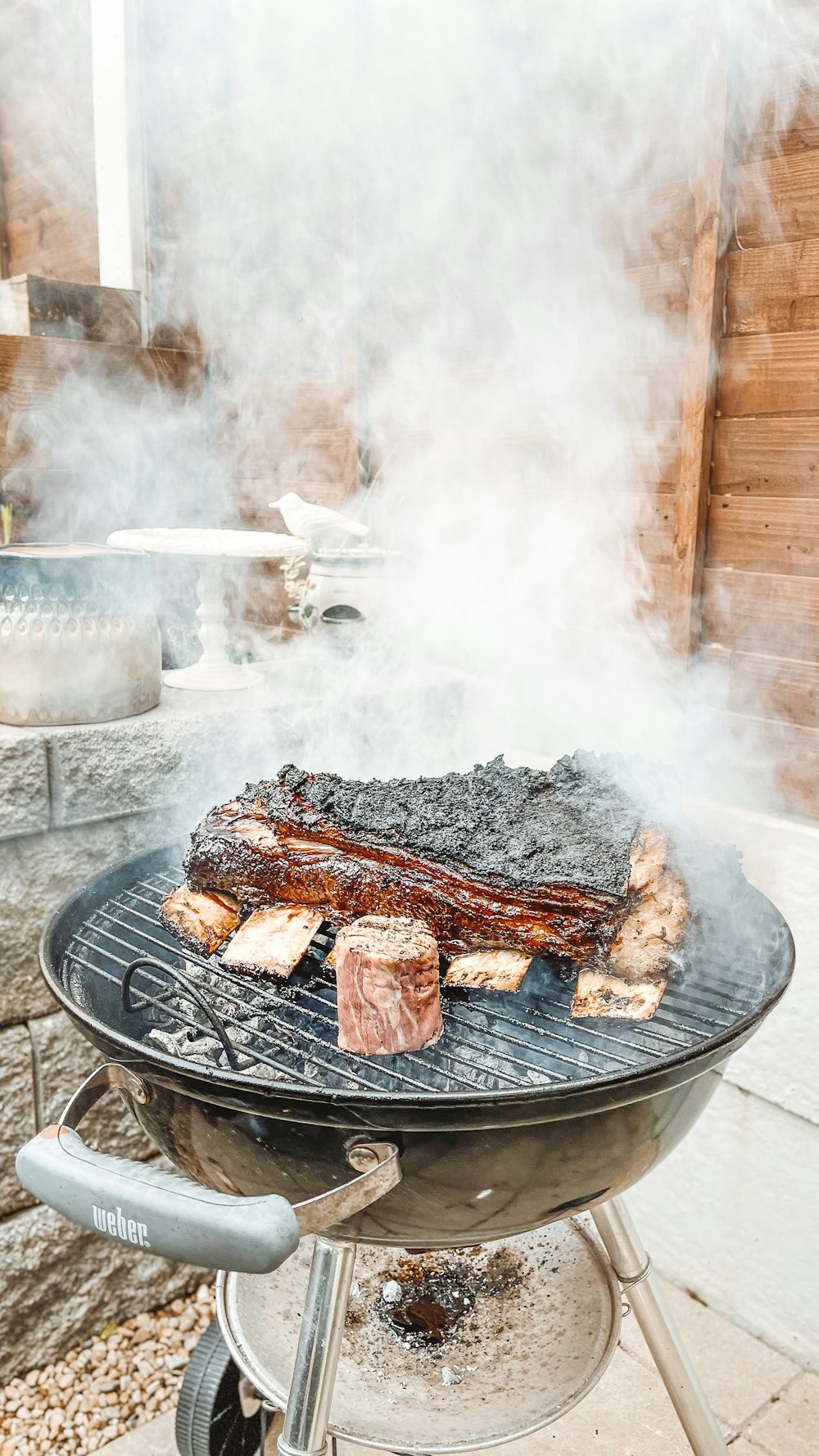 grilled meat on black round plate