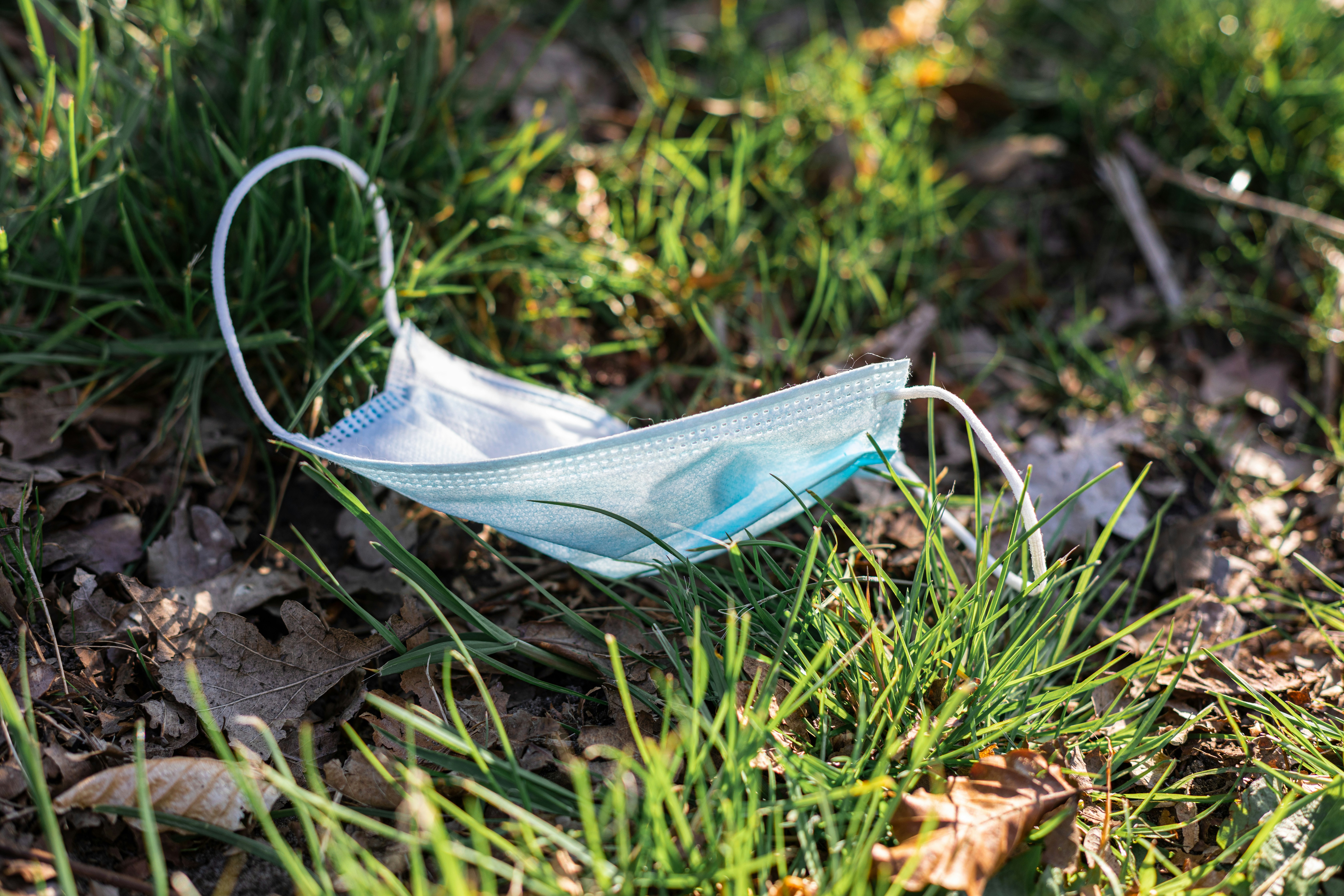 white textile on brown soil